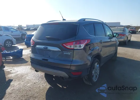2014 Ford Escape Titanium z USA, uszkodzony, nr VIN 1FMCU0JX4EUB28783